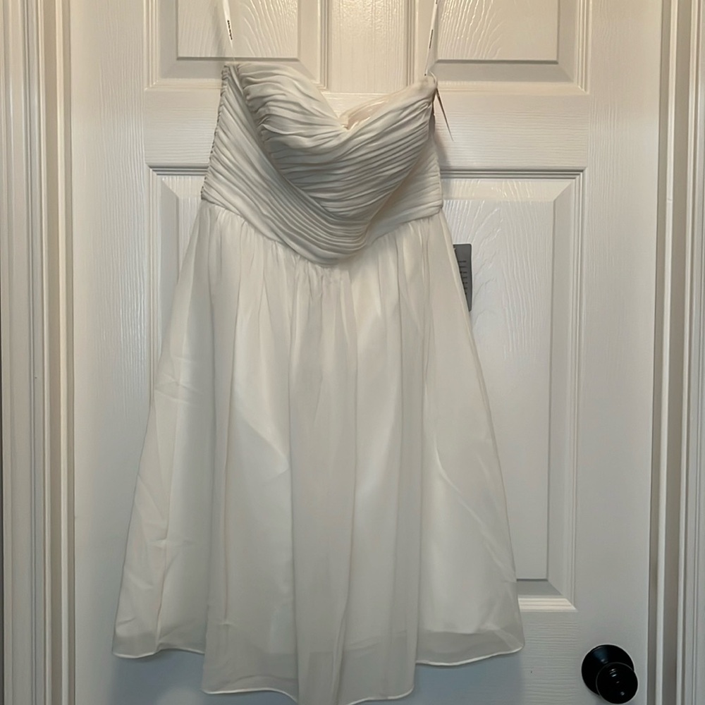 Dona Morgan white dress size 6 with tags. Never worn.